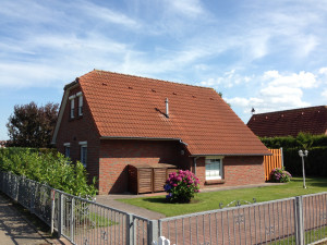 Bild: Ferienhaus Porten,eingezäunter Garten Urlaub mit Hund in Neßmersiel-Nordsee